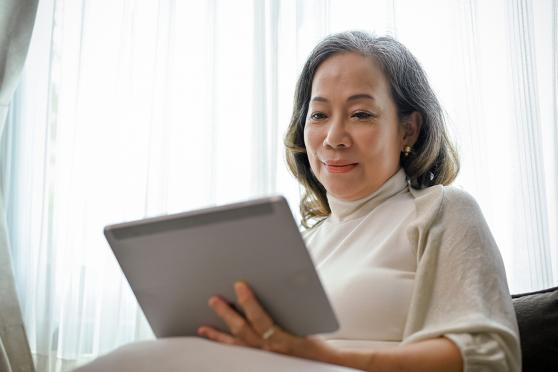 Woman looking at a tablet